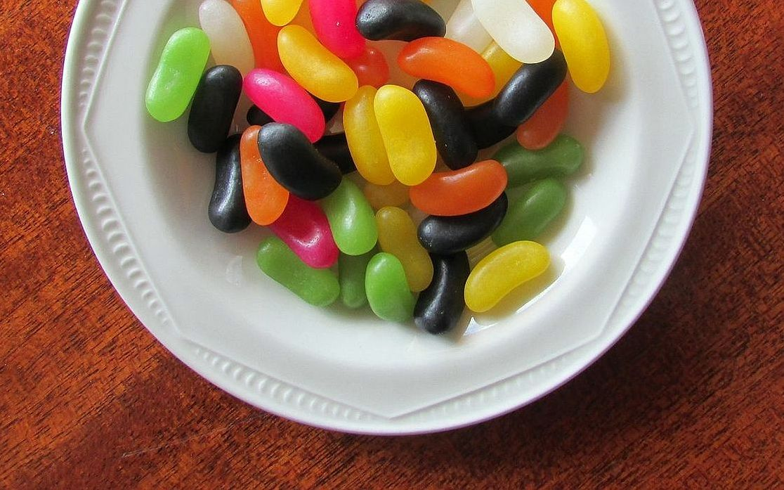A collection of mango, banana, and grapes hard candy with natural gloss